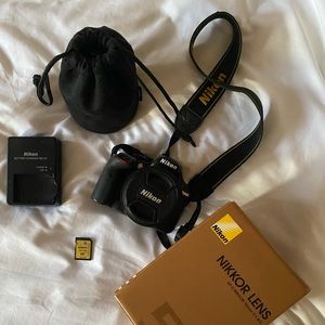 Nikon D3400 DSLR + 50mm portrait lens + tripod